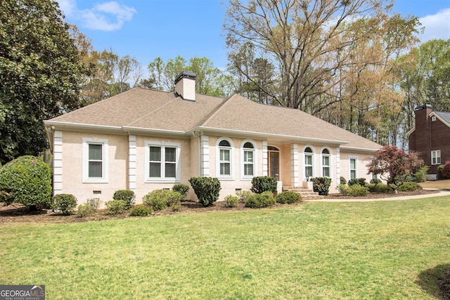 single story home with a front lawn, a chimney, and roof with shingles