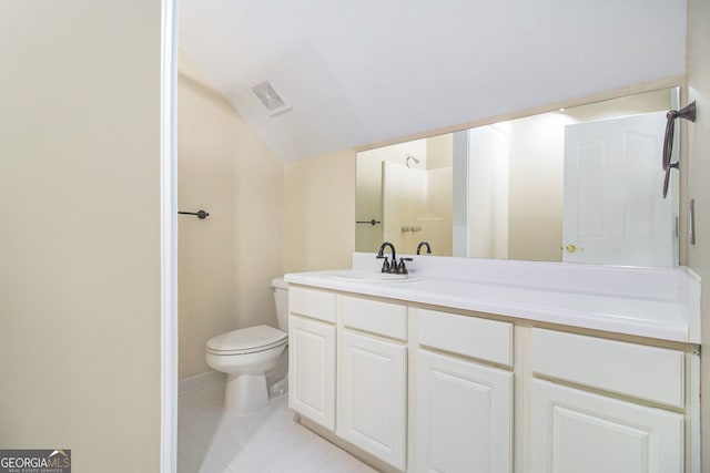 full bath with vaulted ceiling, toilet, tile patterned flooring, and vanity