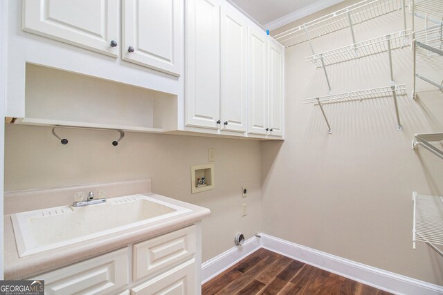 110 Kylemore Pass, Tyrone, GA 30290 - laundry room featuring cabinet space, baseboards, hookup for a washing machine, dark wood-type flooring, and hookup for an electric dryer