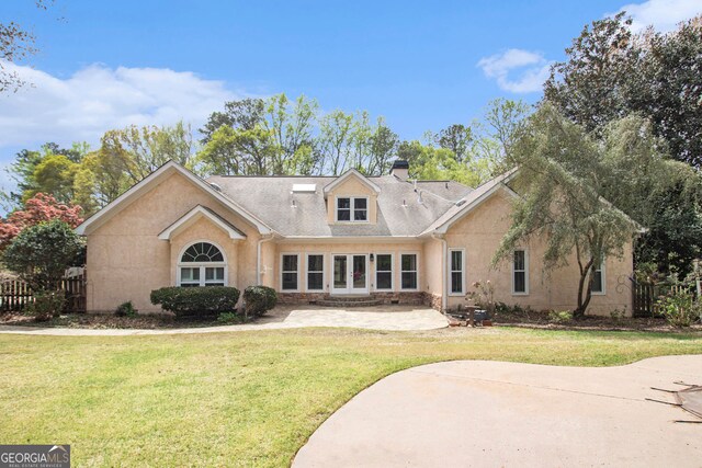 110 Kylemore Pass, Tyrone, GA 30290 - rear view of property featuring a patio, a chimney, and stucco siding