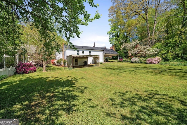 view of yard with fence