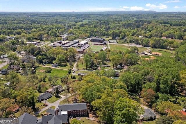 aerial view featuring a view of trees