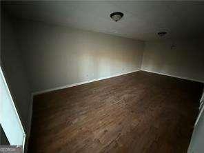 89 Paces Lakes Pt, Dallas, GA 30157 - empty room featuring dark wood finished floors