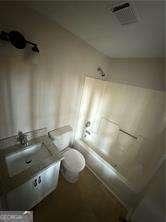 bathroom with a shower