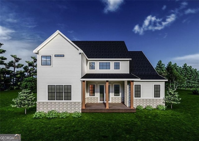 view of front of home featuring a front lawn and covered porch