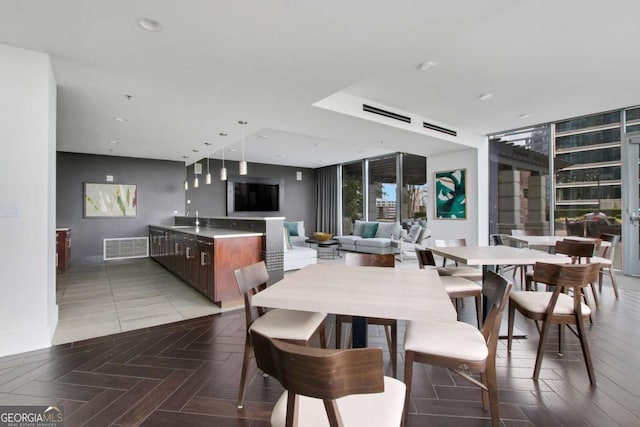 dining space with recessed lighting and visible vents
