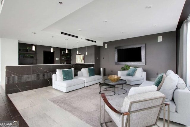 living area with light tile patterned flooring