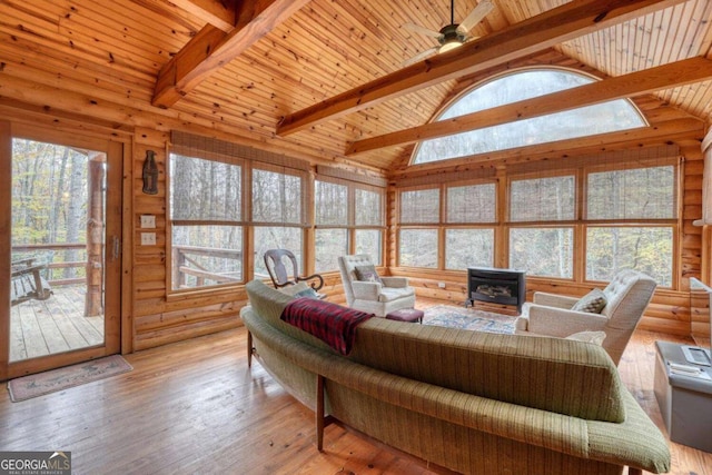 2479 Plum Orchard Rd Unit 1 & 2, Clayton, GA 30525 - living room with a wood stove, plenty of natural light, wood ceiling, ceiling fan, and light wood-type flooring