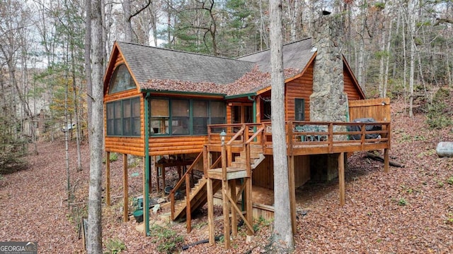 2479 Plum Orchard Rd Unit 1 & 2, Clayton, GA 30525 - rear view of house featuring a shingled roof, a sunroom, stairs, faux log siding, and a deck