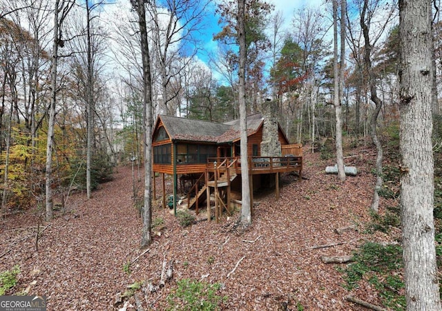 2479 Plum Orchard Rd Unit 1 & 2, Clayton, GA 30525 - view of outdoor structure featuring stairway and a sunroom