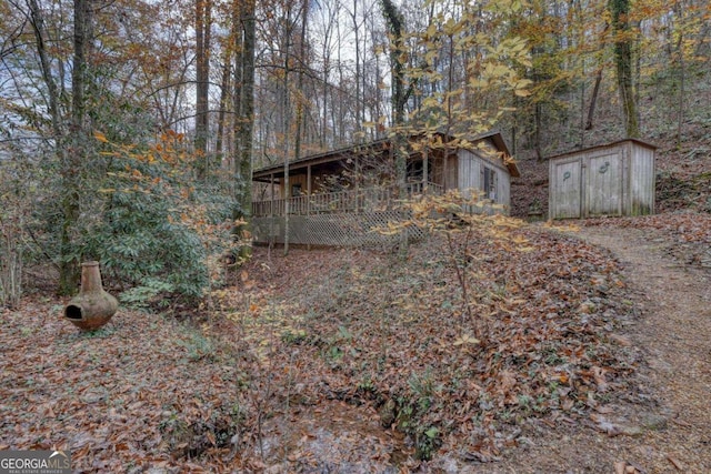 2479 Plum Orchard Rd Unit 1 & 2, Clayton, GA 30525 - view of yard featuring a storage shed