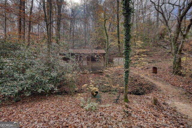 2479 Plum Orchard Rd Unit 1 & 2, Clayton, GA 30525 - view of yard featuring a wooded view