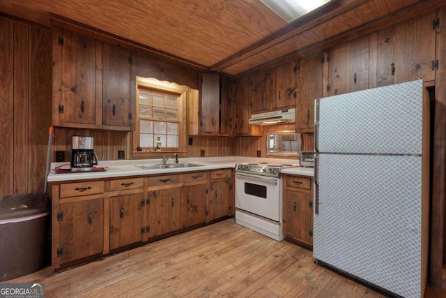 2479 Plum Orchard Rd Unit 1 & 2, Clayton, GA 30525 - kitchen featuring white appliances, under cabinet range hood, a wooden ceiling with exposed beams, light countertops, and light wood-style flooring