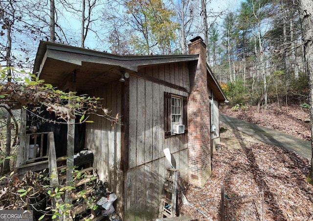 2479 Plum Orchard Rd Unit 1 & 2, Clayton, GA 30525 - view of property exterior featuring a chimney and cooling unit