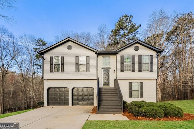4153 Island View Ct, Decatur, GA 30034 - split foyer home featuring a garage, brick siding, and driveway