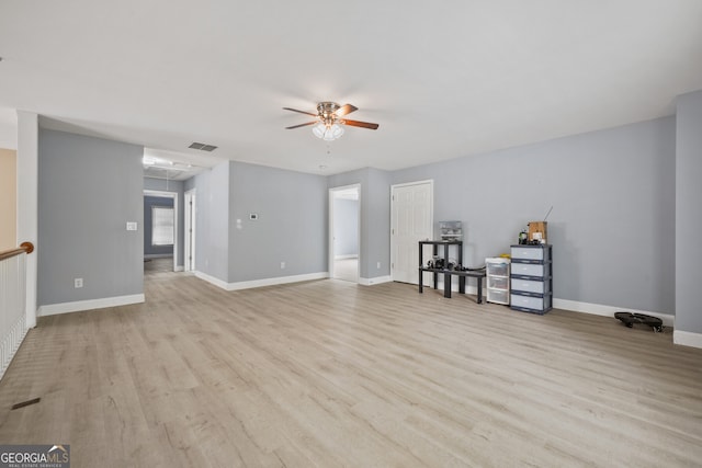 4505 Lakefield Bnd, Berkeley Lake, GA 30096 - living room featuring attic access, a ceiling fan, and wood finished floors