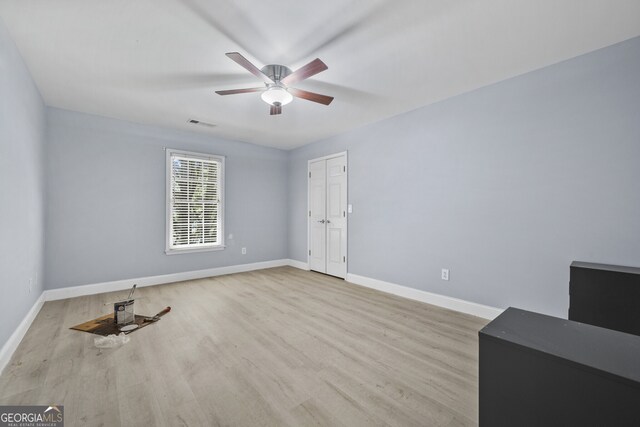 4505 Lakefield Bnd, Berkeley Lake, GA 30096 - unfurnished room featuring a ceiling fan and wood finished floors