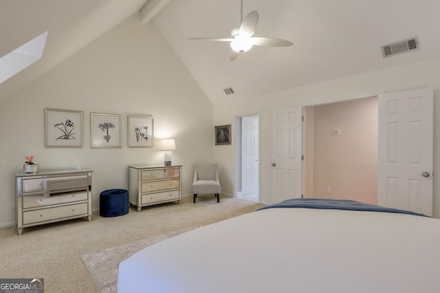 carpeted bedroom with beam ceiling, high vaulted ceiling, and ceiling fan