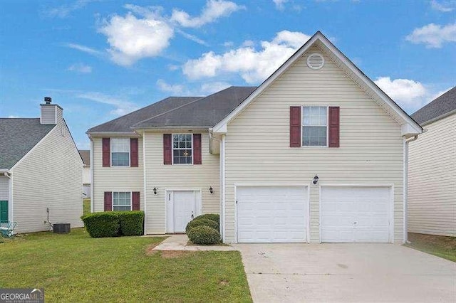 traditional home featuring a front yard, an attached garage, cooling unit, and concrete driveway