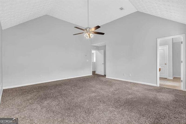 unfurnished room featuring high vaulted ceiling, a textured ceiling, a ceiling fan, carpet floors, and baseboards