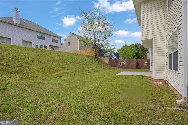 view of yard featuring fence