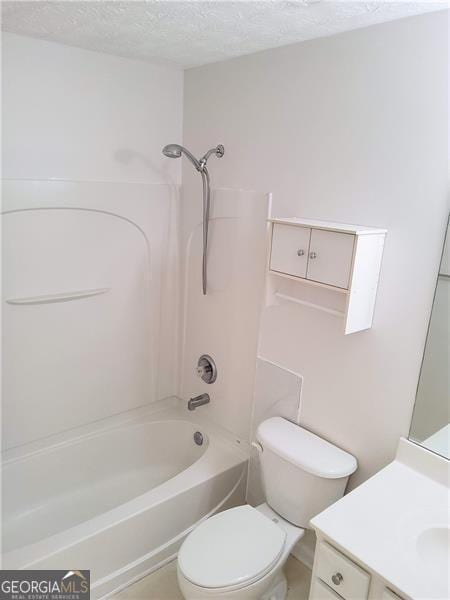 bathroom with toilet, shower / bathtub combination, vanity, and a textured ceiling