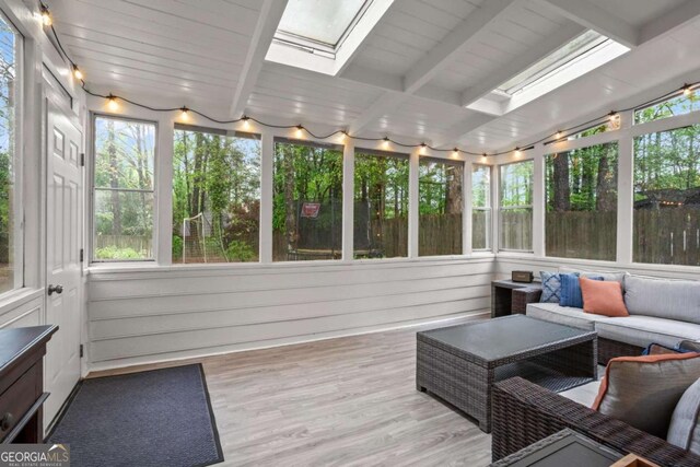 5663 Brookstone Dr NW, Acworth, GA 30101 - sunroom featuring an outdoor living space and a skylight