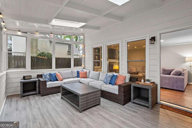5663 Brookstone Dr NW, Acworth, GA 30101 - sunroom / solarium with beamed ceiling, a wooden deck, wood finished floors, and coffered ceiling