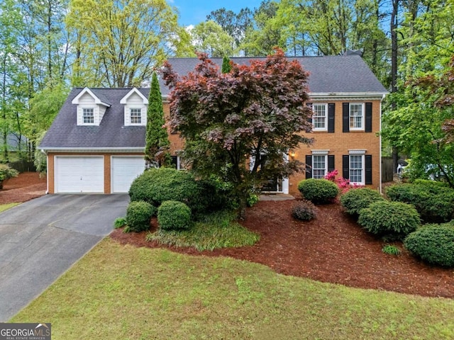 5663 Brookstone Dr NW, Acworth, GA 30101 - view of front facade featuring aphalt driveway and brick siding