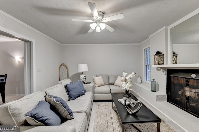 21 W Lake Dr, Oxford, GA 30054 - living area featuring baseboards, a textured ceiling, crown molding, a brick fireplace, and ceiling fan