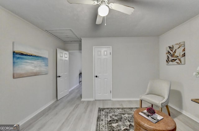21 W Lake Dr, Oxford, GA 30054 - sitting room featuring light wood-type flooring, baseboards, a ceiling fan, and visible vents