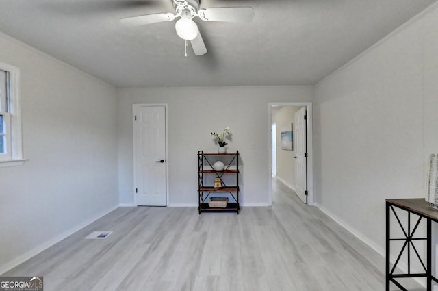 21 W Lake Dr, Oxford, GA 30054 - unfurnished room with visible vents, ceiling fan, baseboards, and wood finished floors