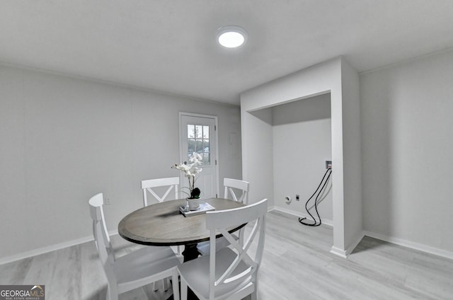 21 W Lake Dr, Oxford, GA 30054 - dining room featuring baseboards and light wood finished floors