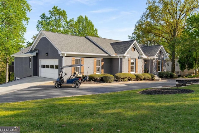 6477 Old Shadburn Ferry Rd, Buford, GA 30518 - view of front of property featuring a garage, asphalt driveway, a front yard, and roof with shingles