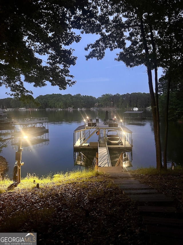 6477 Old Shadburn Ferry Rd, Buford, GA 30518 - dock area with a water view and a forest view