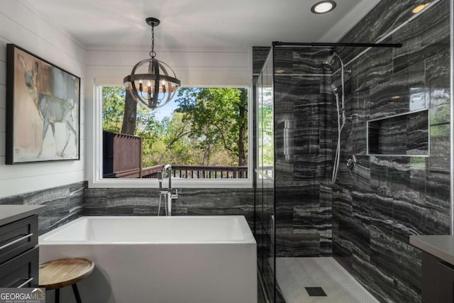 6477 Old Shadburn Ferry Rd, Buford, GA 30518 - bathroom featuring vanity, a stall shower, a chandelier, and a freestanding bath