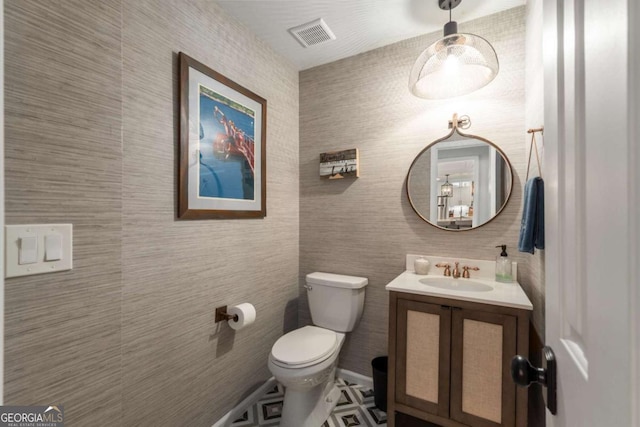 6477 Old Shadburn Ferry Rd, Buford, GA 30518 - bathroom featuring toilet and vanity
