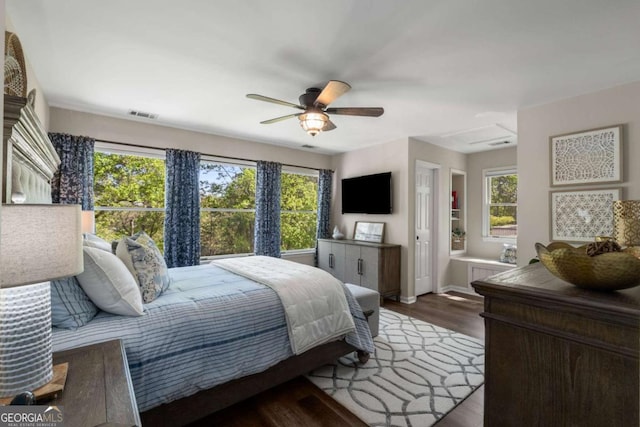 6477 Old Shadburn Ferry Rd, Buford, GA 30518 - bedroom with wood finished floors, baseboards, a ceiling fan, and attic access