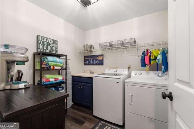 6477 Old Shadburn Ferry Rd, Buford, GA 30518 - laundry area with washer and clothes dryer, dark wood-style floors, and cabinet space