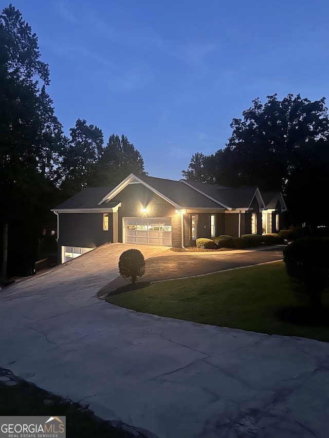 6477 Old Shadburn Ferry Rd, Buford, GA 30518 - ranch-style home with a garage, driveway, and a front yard