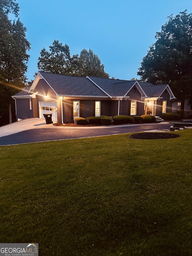 6477 Old Shadburn Ferry Rd, Buford, GA 30518 - ranch-style house featuring driveway, a garage, and a front yard