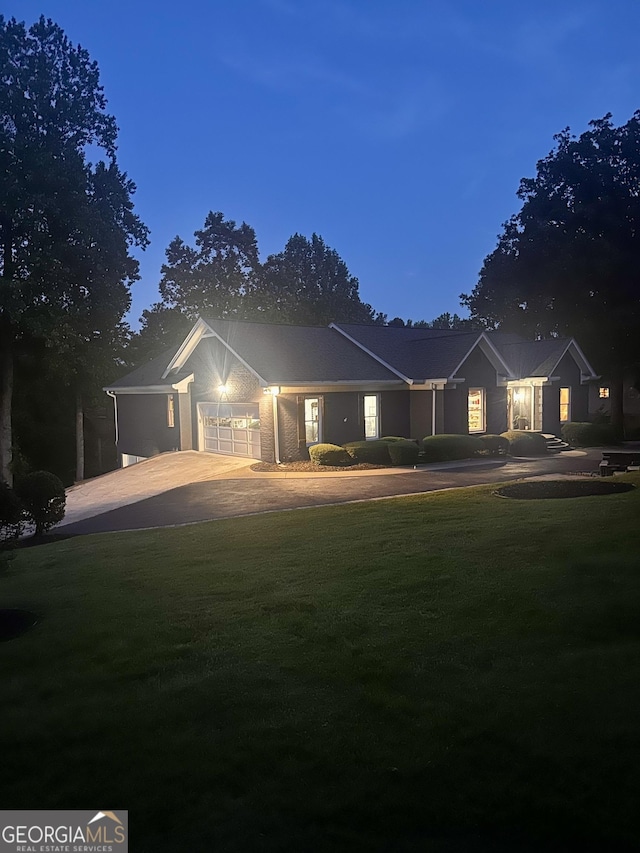 6477 Old Shadburn Ferry Rd, Buford, GA 30518 - ranch-style house featuring a front lawn, a garage, and driveway