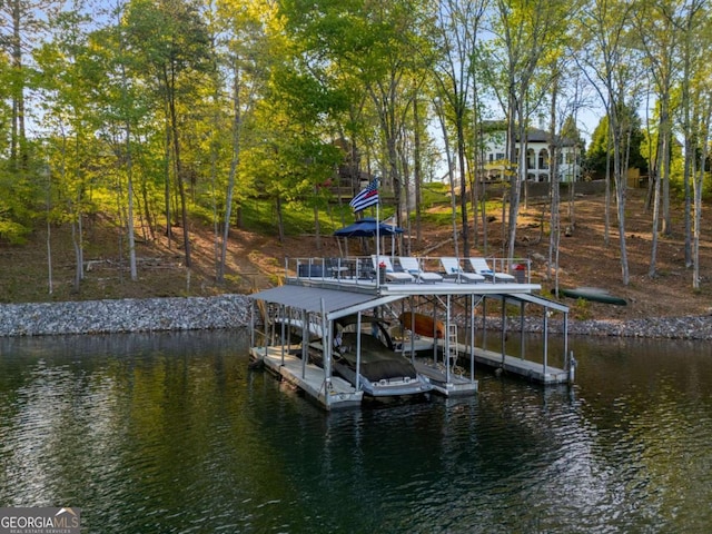 6477 Old Shadburn Ferry Rd, Buford, GA 30518 - dock featuring boat lift and a water view