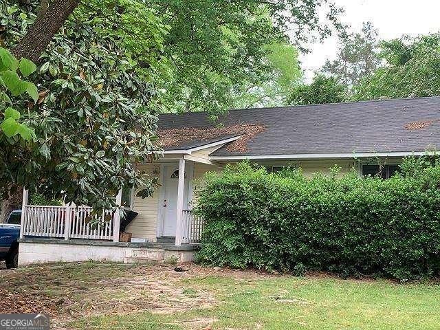 1914 Bragg St, Brookhaven, GA 30341 - view of front of house featuring roof with shingles and a porch