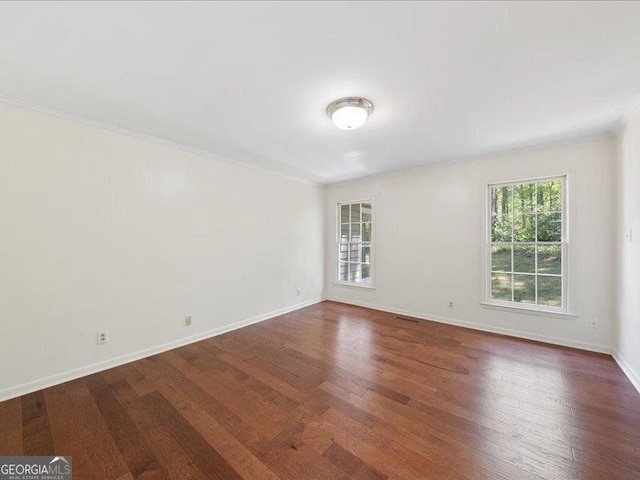 5761 Kentucky Downs Dr, Macon, GA 31210 - unfurnished room featuring wood finished floors and crown molding