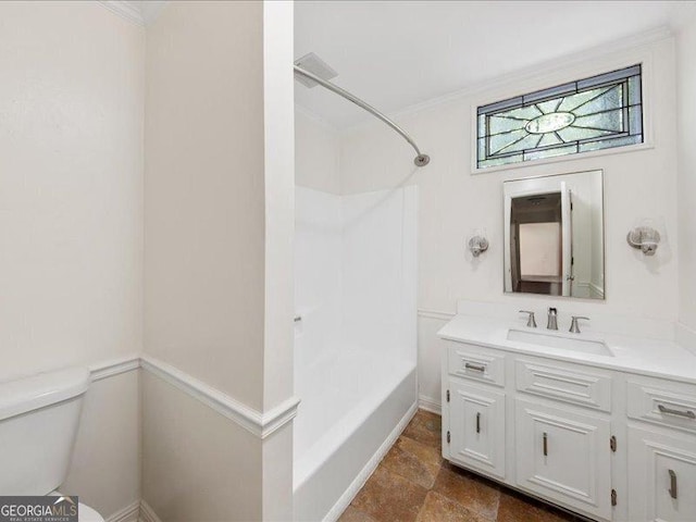 5761 Kentucky Downs Dr, Macon, GA 31210 - full bathroom featuring vanity, shower / bath combination, crown molding, and stone finish floors