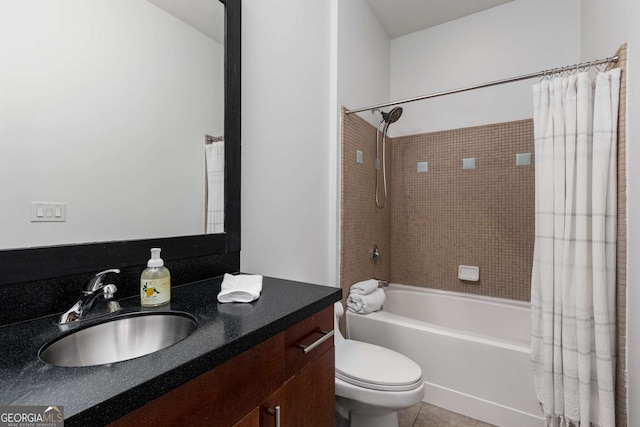 747 Ralph Mcgill Blvd NE Unit 223, Atlanta, GA 30312 - full bath featuring shower / bath combo with shower curtain, vanity, toilet, and tile patterned floors