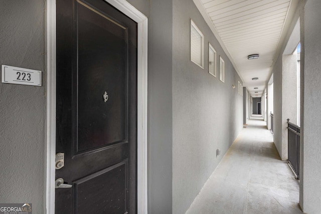 747 Ralph Mcgill Blvd NE Unit 223, Atlanta, GA 30312 - corridor featuring a textured wall and carpet floors