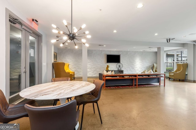 747 Ralph Mcgill Blvd NE Unit 223, Atlanta, GA 30312 - dining area with finished concrete floors, recessed lighting, and a chandelier