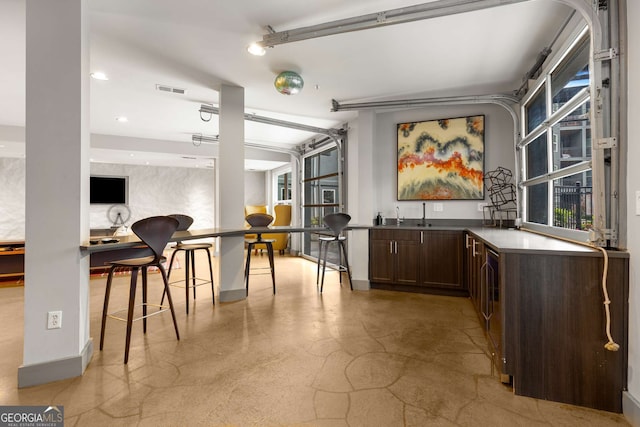 747 Ralph Mcgill Blvd NE Unit 223, Atlanta, GA 30312 - bar area featuring baseboards and recessed lighting